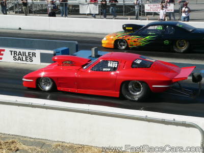 1963 RED CORVETTE STAGED
