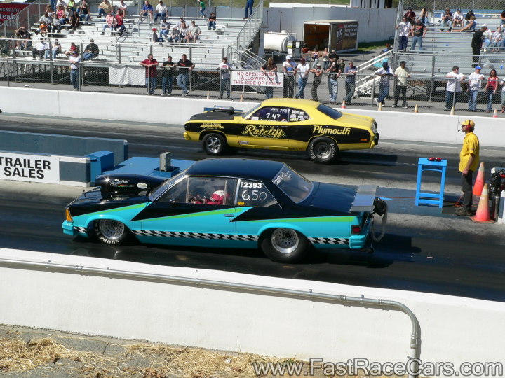 Blue and Black Pontaic Grand Prix Drag Car